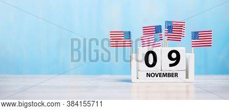 9 November Of White Calendar With United States Of America Flag On Wood Background. Veterans Day 202