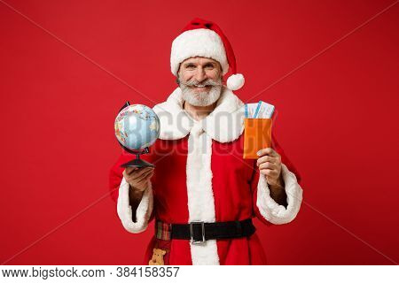 Smiling Elderly Gray-haired Mustache Bearded Santa Man In Christmas Hat Posing Isolated On Red Backg