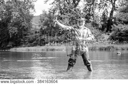 Now The Real Fun Begins. Summer Weekend. Fisherman With Fishing Rod. Mature Man Fishing. Pothunter. 