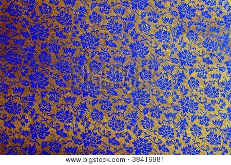 ผ้าลายดอกไม้สีฟ้าพื้นหลัง