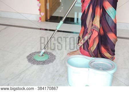 Mopping Disinfecting Floor At Home, Protection Against Covid-19 / Coronavirus, House Hygiene And Cle