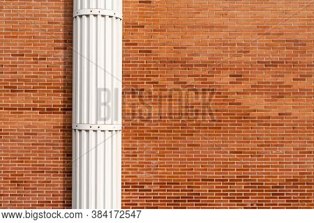 Red Brick Wall With White Decorative Column. Copspace