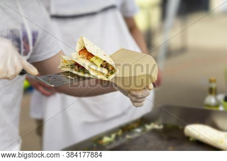 Hands Cook Serving Healthy Fresh Fajitas Or Fajitos With Cheese, Beef, Tomatoes, Hot Grill. Concept 