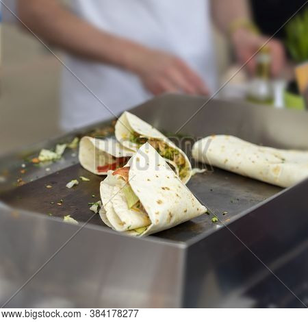 Fast Food Cooking. Portion Of Tortilla, Fajitas, Process Of Preparing. Concept Of National Food, Hea
