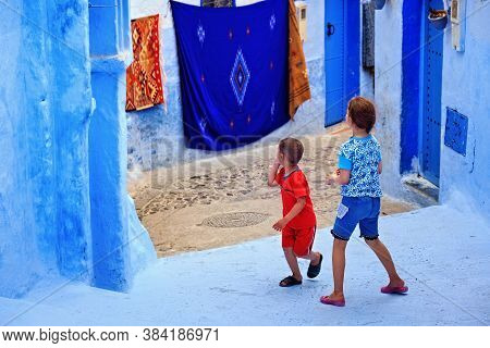 Chefchaouen, Morocco - May 28, 2017: Unknown Locals Children Of Medina In Chaouen. The City Is Noted