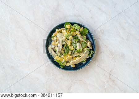 Sliced Artichoke With Broad Beans, Purslane Salad, Grated Parmesan Cheese And Olive Oil.
