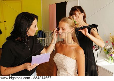 Backstage Prepare Young Beautiful Modeling Stylist Hairdresser And Makeup Artist Working On Model In