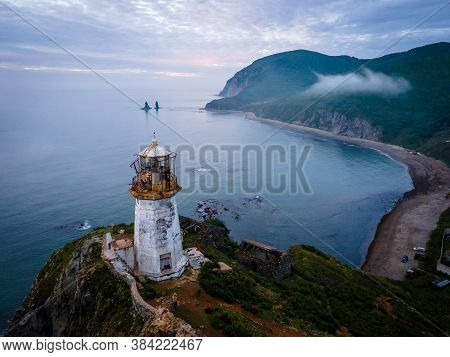 Above. Rudny Lighthouse At Cape Briner In The Village Of Smychka (rudnaya Pristan), Primorsky Territ