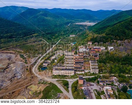 View From Above. Ruined And Abandoned Buildings Of A Tin Mining Factory In The Village Of Kavalerovo
