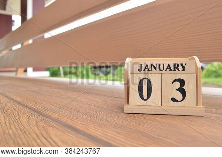 January 3, Number Cube With Wooden Balcony Background.