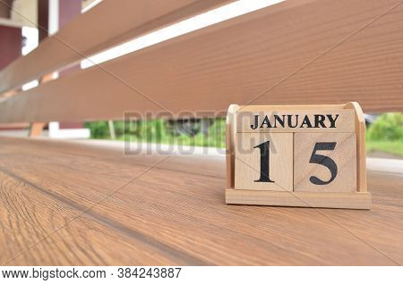 January 15, Number Cube With Wooden Balcony Background.