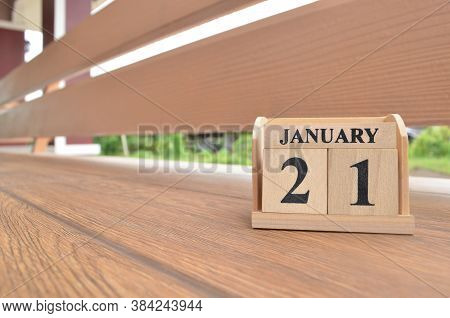 January 21, Number Cube With Wooden Balcony Background.