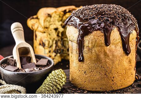 Homemade Panettone Covered In Chocolate And Sprinkles, Called Chocotone. Christmas Bread Served As D