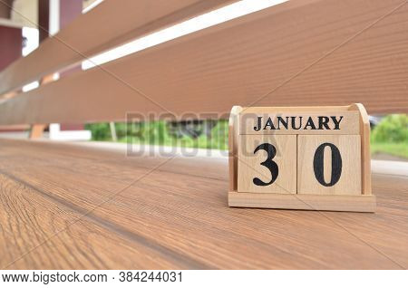January 30, Number Cube With Wooden Balcony Background.