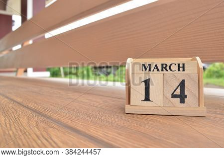 March 14, Number Cube With Wooden Balcony Background.