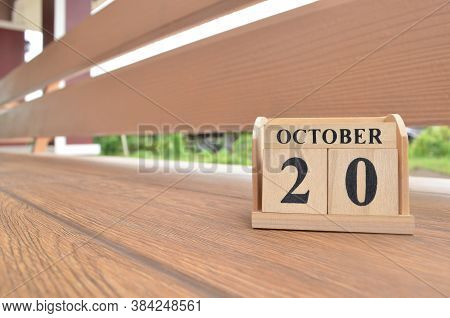 October 20, Number Cube With Wooden Balcony Background.