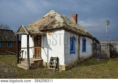 Clay Village House With A Thatched Roof. Ertil. Voronezh Region. Russia. March 2019