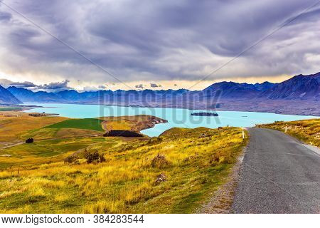 New Zealand, South Island. Lake Tekapo on cloudy day. The lake in the mountains. Travel to a faraway country. The concept of active, exotic and photo tourism