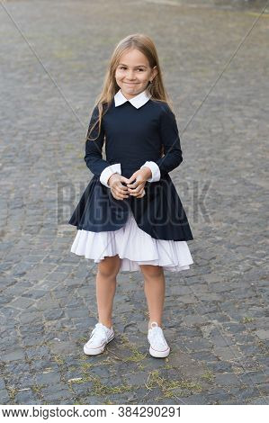 Find Your Inner Diva. Happy Child Wear Uniform Outdoors. Fashion Look Of Little Schoolgirl. Formal E