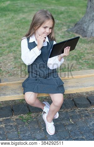E-book For Your School Library. Happy Kid Read E-book. E-reader Or Tablet Computer. Reading Online. 