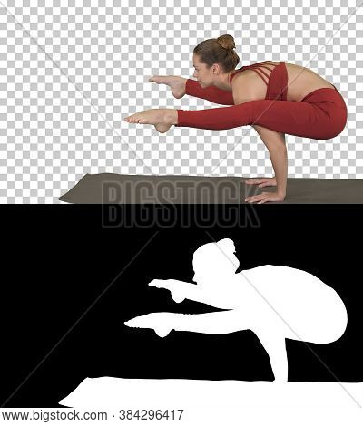 Beautiful Young Fit Woman Wearing Sportswear Doing Handstand, Variation Of Firefly Posture, Tittibha