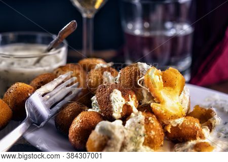 Fried Mozzarella Cheese Balls Mozarella Fritta, Appetizer. Glass Of Wine And Water On Background. Re