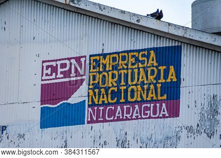 Corinto, Nicaragua - November 27, 2008: Closeup Of Official Name Of Operator Of The Port Painted On 