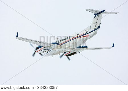 Private Jet Plane Taking Off In The Sky