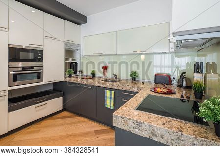 Modern Interior Of Kitchen. Stylish Kitchen Set. Home Appliances.