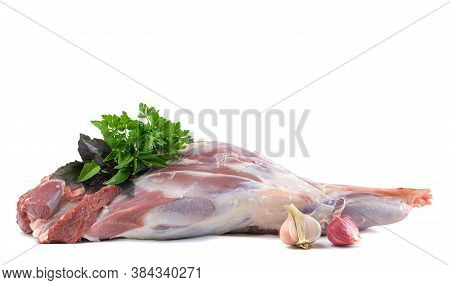 Raw Leg Of Mutton On A Bone On A White Isolated Background. Sheep Meat Close-up.a Fresh Piece Of Mut