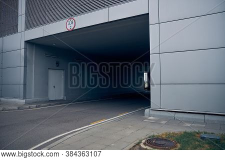 Tunnel With Asphalt Road At Airport Territory