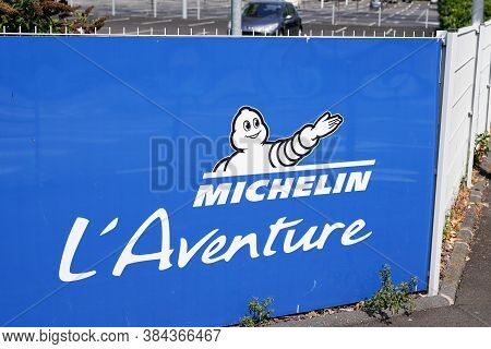 Clermont-ferrand, , Auvergne / France - 09 01 2020 : Michelin L'aventure Bibendum Logo Sign And Text
