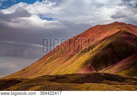 Close-up Of The Slope Of The Mountain With Red Sand. Kyrgyz Nature.