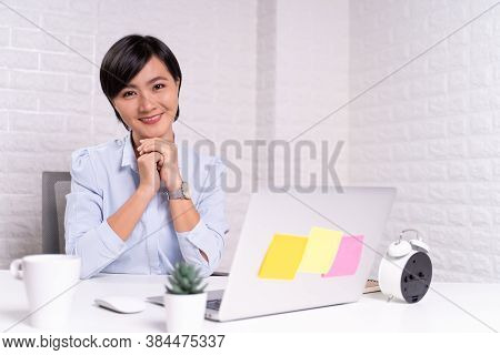 Happy Woman Sitting At Home Office Working Using Computer Laptop