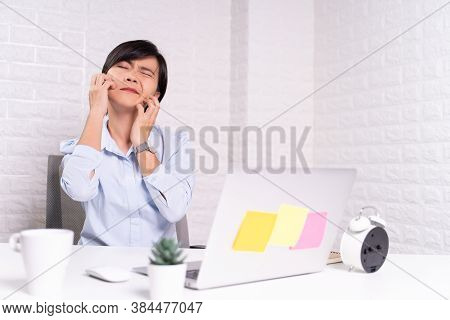 Woman Scratching Her Skin At Office