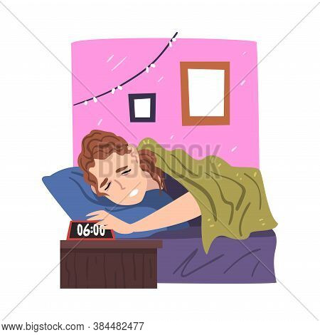 Woman Lying On Her Bed Being Woken Up By Alarm Clock, Businesswoman Or Office Employee Daily Routine