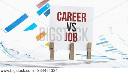 Career Vs Job Text On Paper Sheet With Chart, Dice, Spectacles, Pen, Laptop And Blue And Yellow Push
