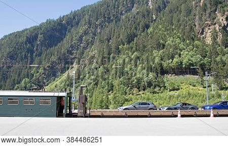Lötschberg, Switserland On July 20, 2020: Car Train Arriving At Lötschberg, The Only Way To Get To T