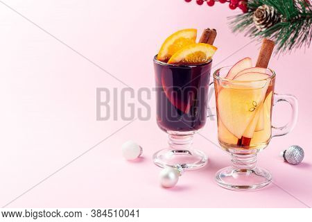 Red And White Glogg Or Mulled Wine With Orange And Apple Slices And Cinnamon Stick, Christmas Decora