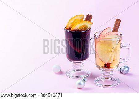 Glasses With Red And White Glogg Or Mulled Wine With Orange And Apple Slices And Cinnamon Stick, Chr