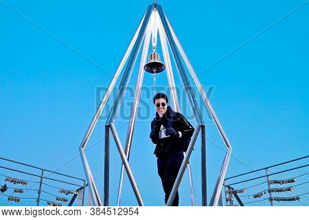 Sapporo, Hokkaido, Japan - December 2019 : A Man At Top Of Mt. Moiwa In Sapporo City With Night City