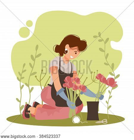 Cheerful Florist Woman Makes A Flower Bouque. Happy Girl Enjoying Her Hobby Draws Up Flower Arrangem