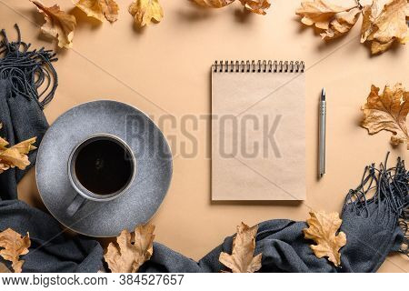 Autumn Coffee In Grey Cup, Scetchbook, Warm Scarf And Dry Oak Leaves On Beige Fall Background. Thank