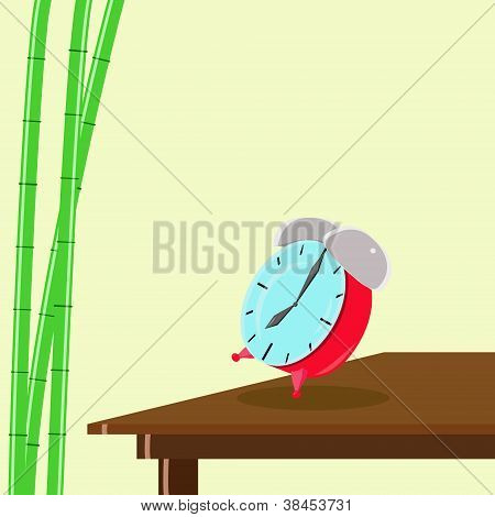 Reloj con alarma y bambú