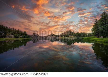 Stunning Multicolored Sunrise Reflecting On Sylvan Lake In Custer State Park, Sd