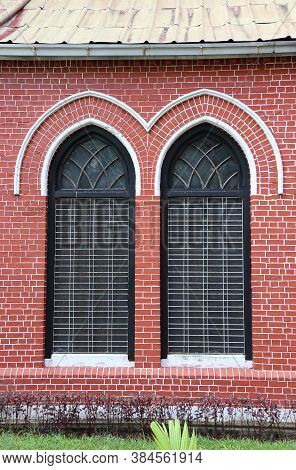 Window Frame And Red Brick Of Exterior Of Main Church At Cathedral Of The Holy Trinity, The Church O