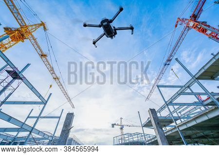 Drone Over Construction Site. Video Surveillance Or Industrial Inspection