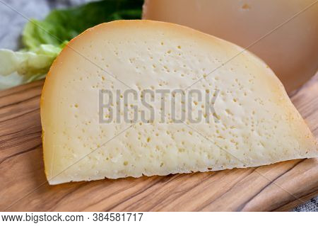 Cheese Collection, French Fol Epi  Cheese With Many Little Holes And Ossau Iraty Cheese