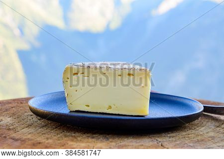 Cheese Collection, French Tomme De Savoie Or Tome Des Bauges Cheese Served Outdoor With Alpine Mount