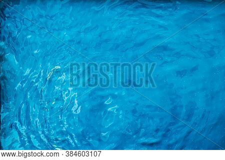 Blue Water Texture As Abstract Background, Swimming Pool And Waves Design